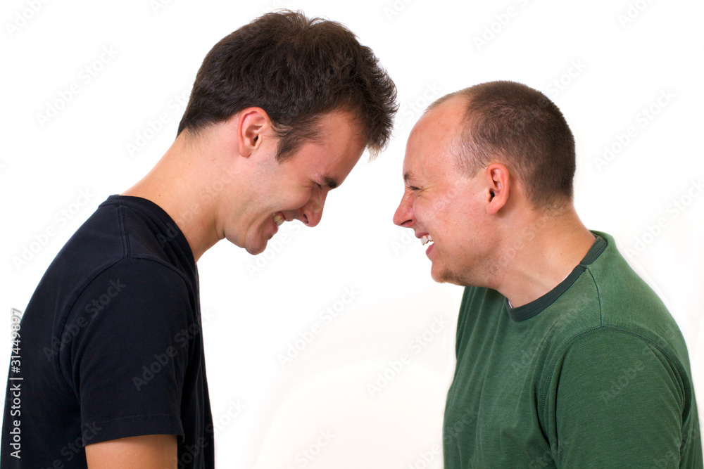 Young men goofing around laughing together Young men goofing around laughing together