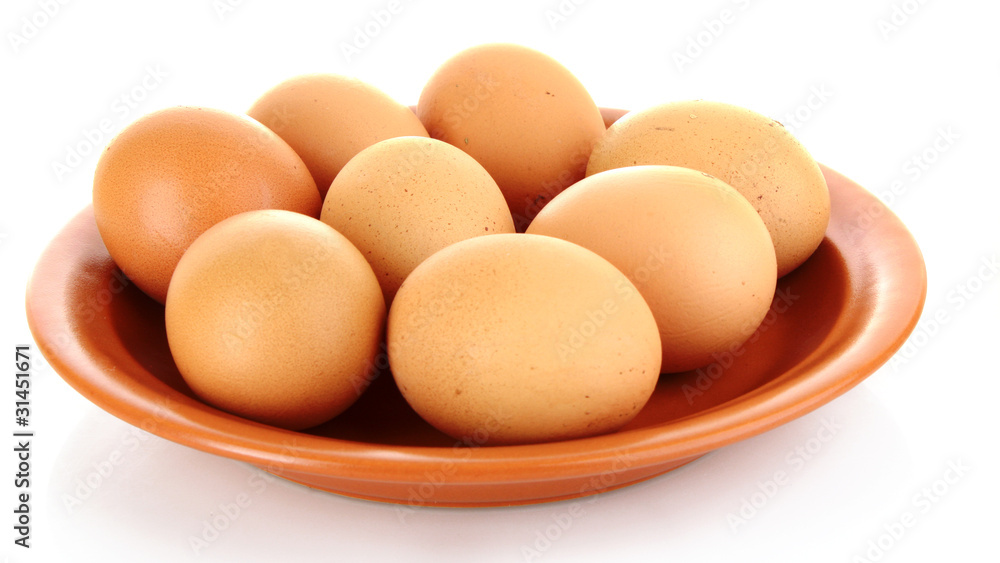 Eggs in plate isolated on white Eggs in plate isolated on white