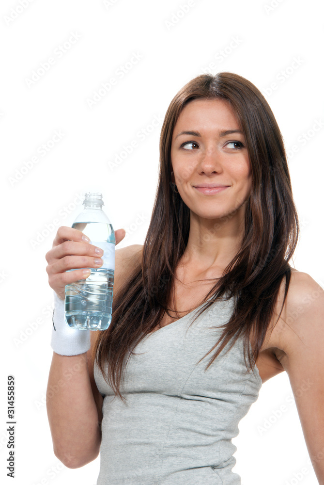 Woman hold bottle of pure still drinking water Woman hold bottle of pure still drinking water