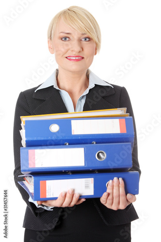 Happy mature business woman's holding documents.