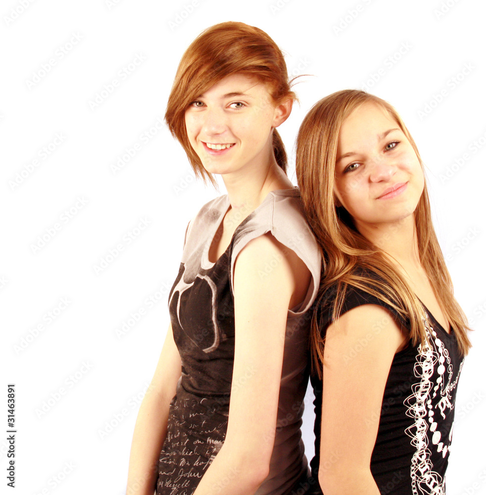 two teenage girls in studio white background 2 two teenage girls in studio white background 2