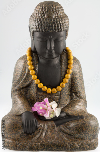 bouddha au collier fleuri photo