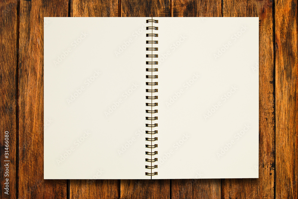 blank notebook open on wood background blank notebook open on wood background