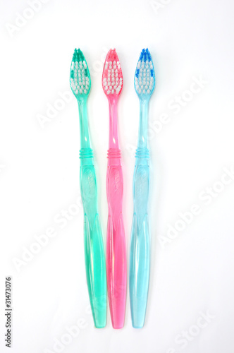 three toothbrushes
