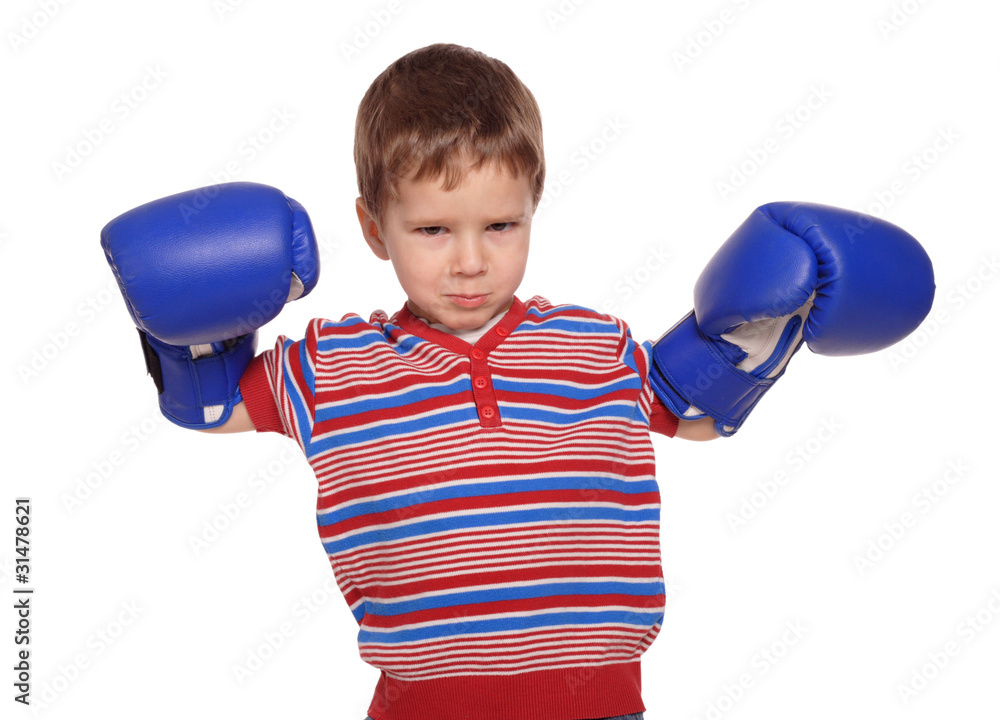 Anger little boy with boxing gloves, isolated on white