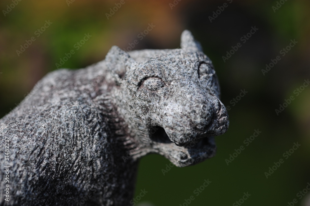 Obraz premium Stone sculprure of the tiger