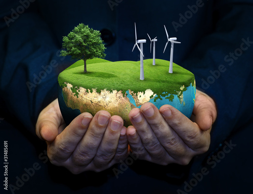 holding a green earth