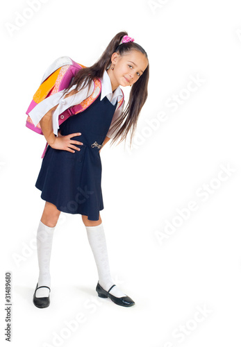 The girl with a school bag on a white background