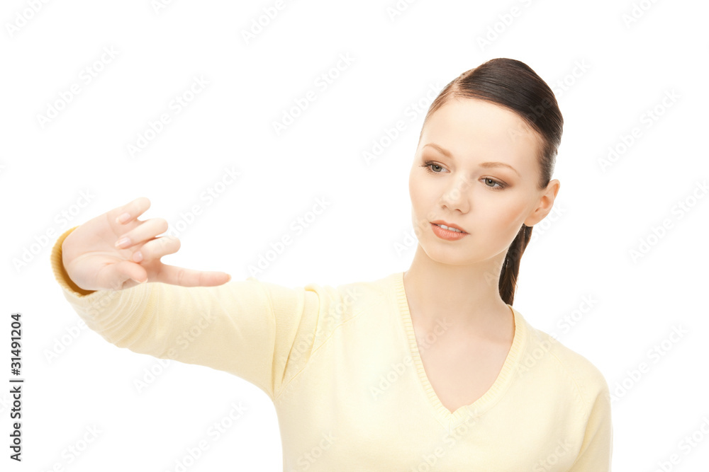 businesswoman working with something imaginary businesswoman working with something imaginary