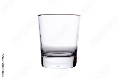 Billede på lærred Single empty whisky glass