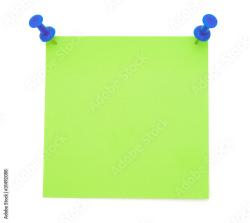Green Post-it Note with Pushpins isolated on white background