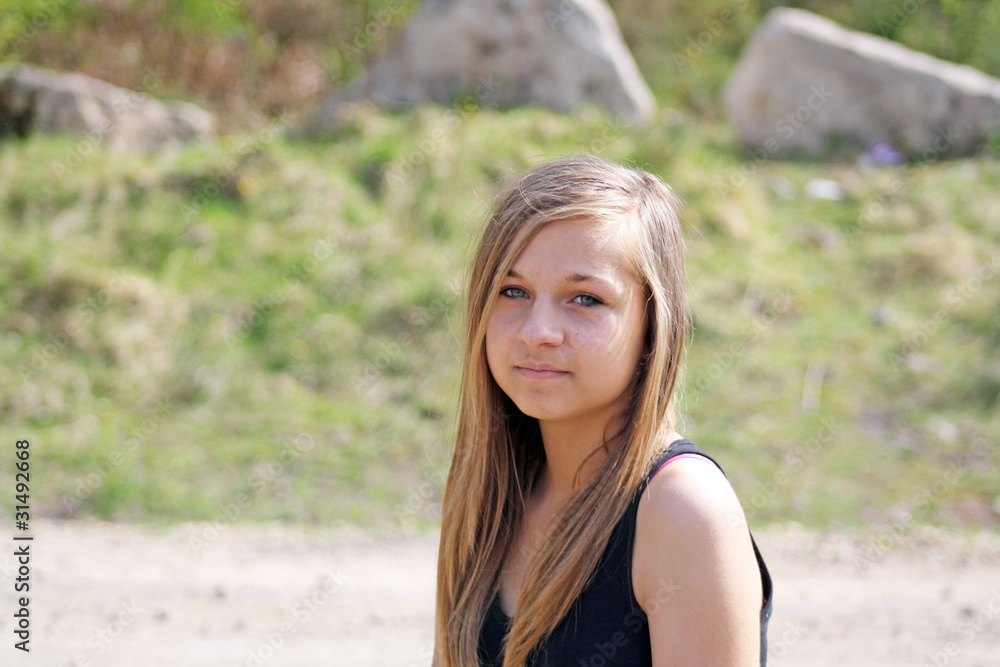 Naklejka premium pretty teenage girl in the woods 3