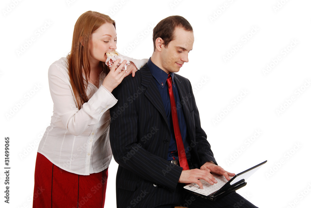 Two happy businesspeople working together - isolated on white Two happy businesspeople working together - isolated on white