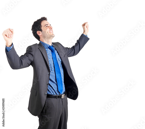 Very happy energetic businessman with his arms raised