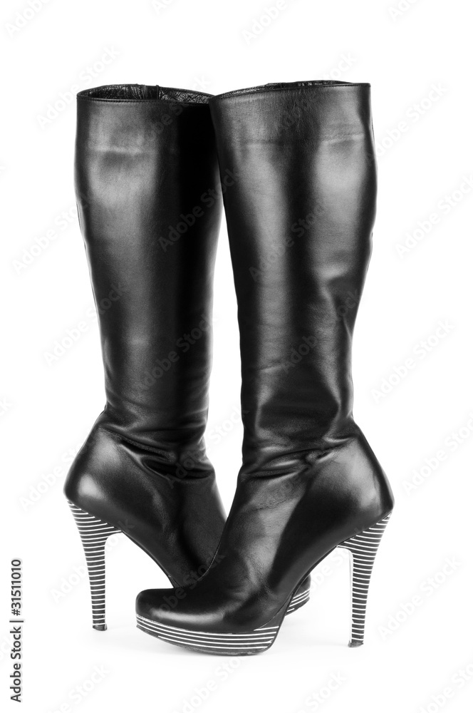 Fashion concept with woman top boots Fashion concept with woman top boots