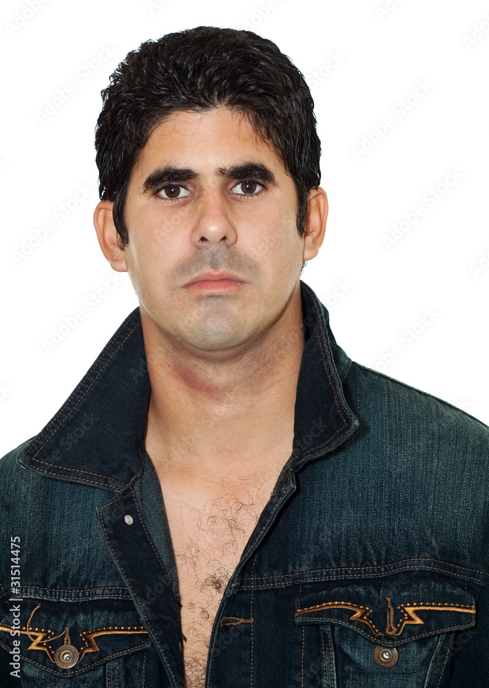 Fototapeta premium Handsome young hispanic man wearing an open denim jacket isolate