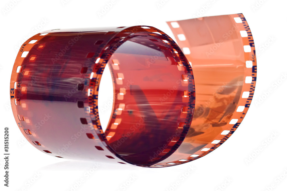 Roll of 35 mm photographic film on a white background