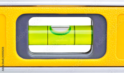 Macro shot of a yellow spirit level photo