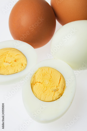 Hard boiled eggs on white background