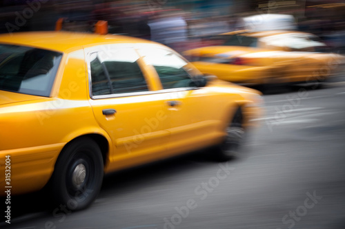 Speeding Yellow Taxi Cabs Motion Blur