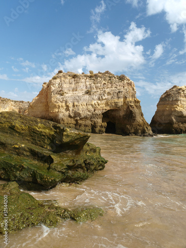 Algarve coast at low tide the ocean .