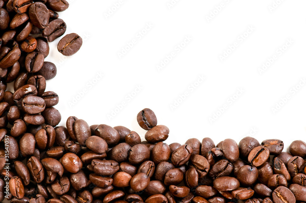 Coffee beans on the white background with copy space Coffee beans on the white background with copy space