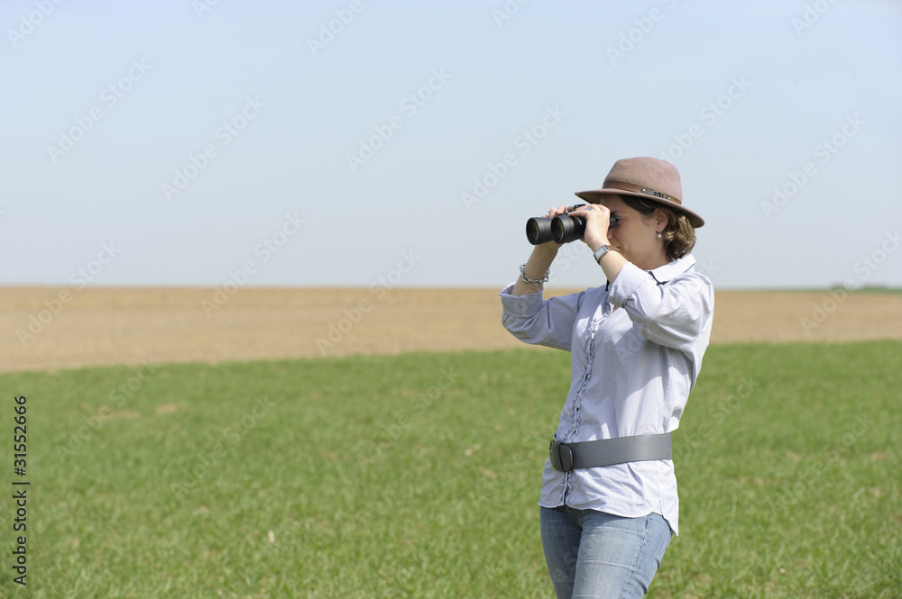 Outdoor with binoculars in the fields Outdoor with binoculars in the fields