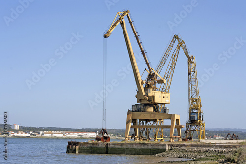 one giant, yellow crane for industrial purpose