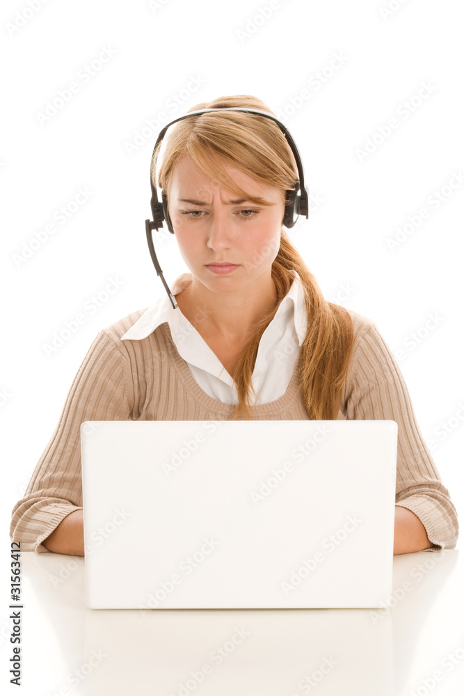 Telephone operator with laptop computer Telephone operator with laptop computer