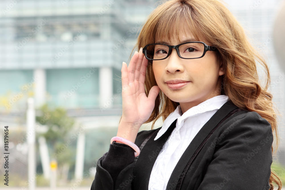 Great smiling outdoor young executive