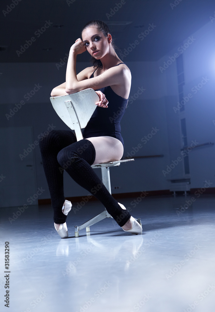 Fototapeta premium ballerina is doing exercises in ballet class