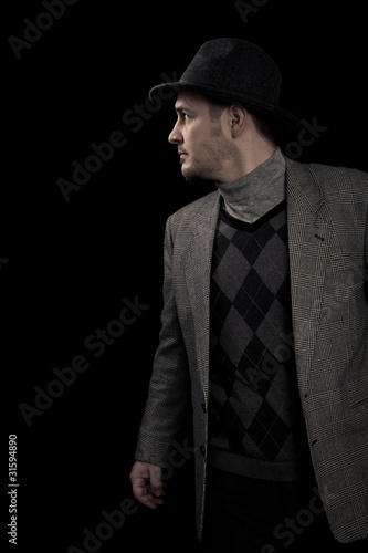 Man with suit and hat