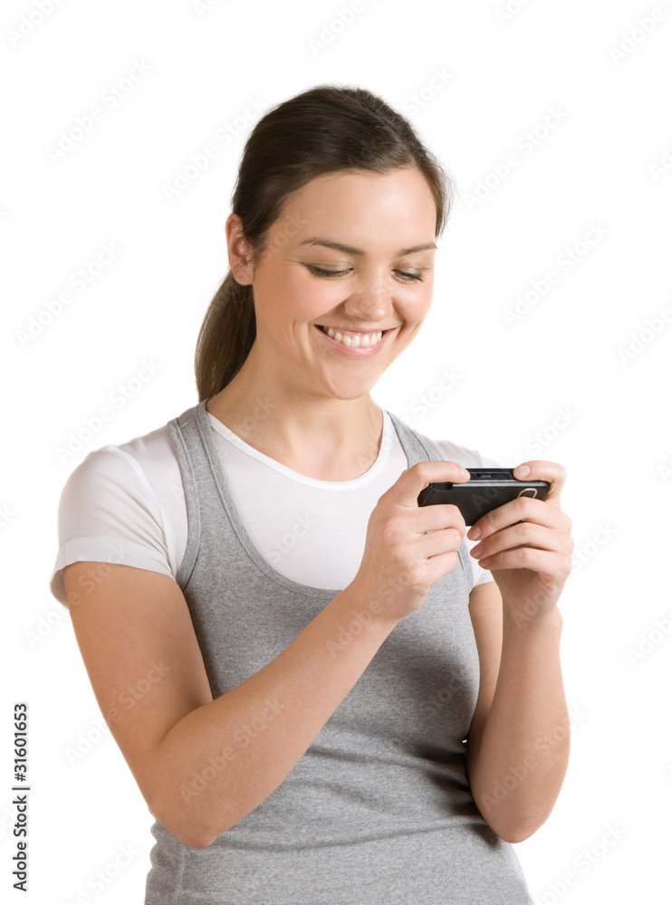 A pretty girl reads a joyful message on your mobile phone A pretty girl reads a joyful message on your mobile phone