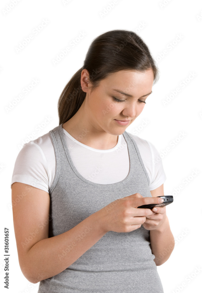 A pretty girl reads a message on your mobile phone A pretty girl reads a message on your mobile phone