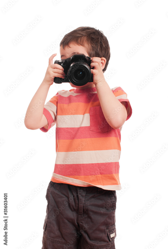 Little boy photographer with slr camera Little boy photographer with slr camera