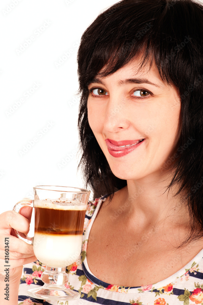 Woman with cappuccino licks her lips Woman with cappuccino licks her lips
