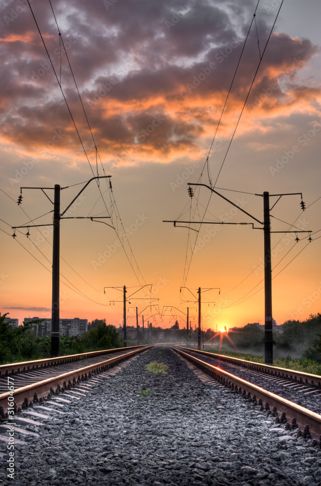 Railway way on sunset of a sun