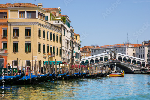 Venice Grand canal with gondolas and Rialto Bridge, Italy © EMrpize