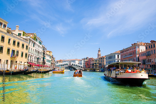 Venice Grand canal with gondolas and Rialto Bridge  Italy