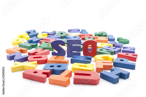 The word seo written with colorful wooden letters
