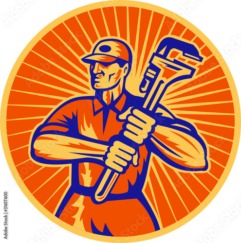 plumber holding monkey wrench