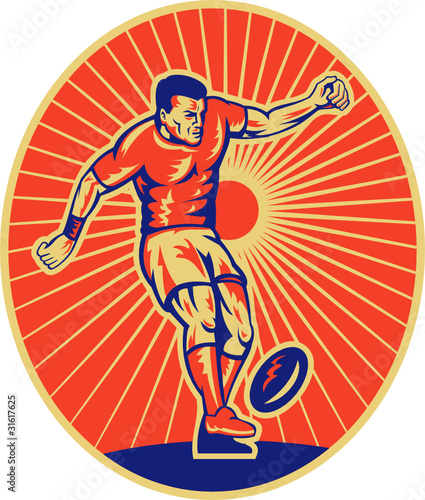 rugby player kicking ball