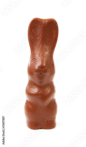 Milk chocolate easter bunny over white background