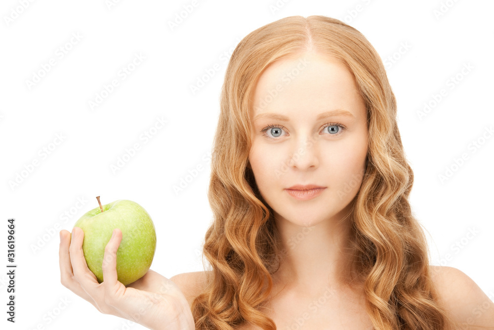 young beautiful woman with green apple young beautiful woman with green apple