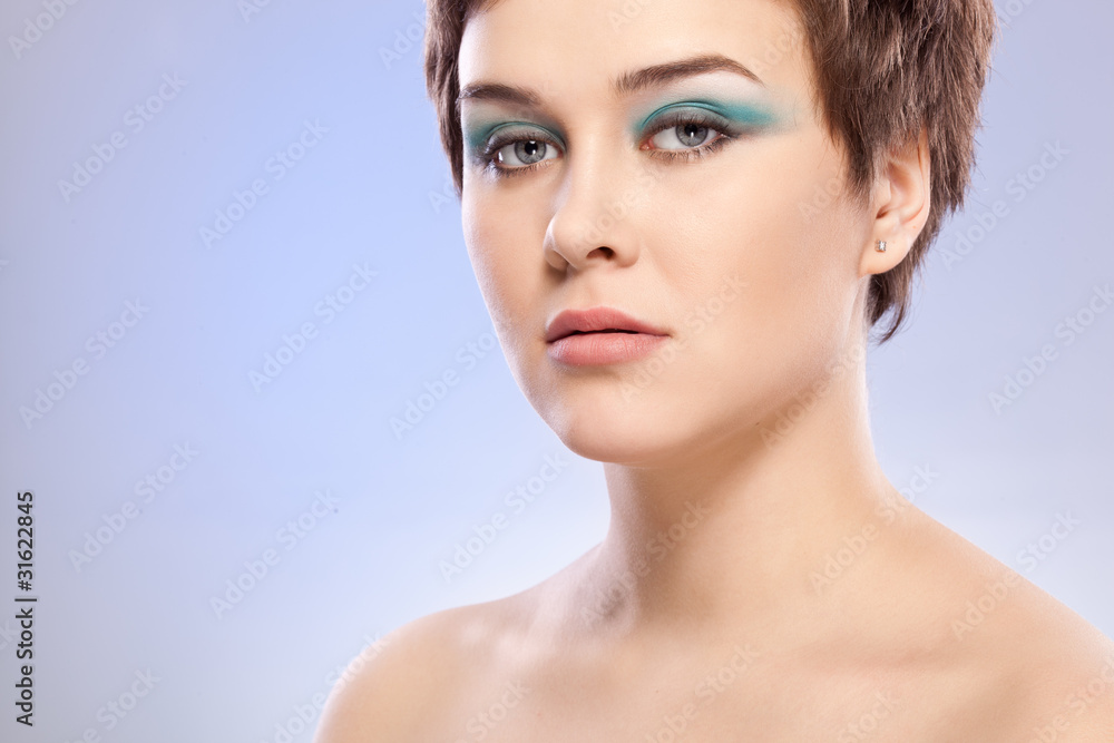 brunette woman portrait with blue makeup brunette woman portrait with blue makeup
