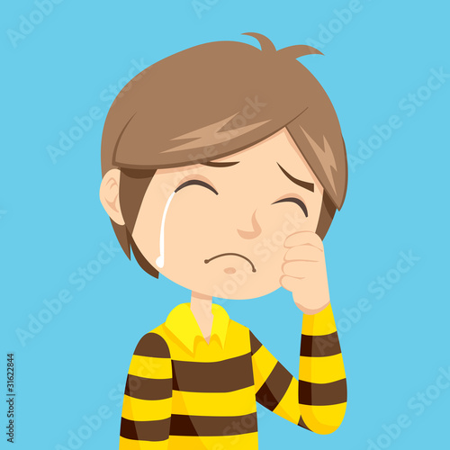 Lonely and sad little boy crying