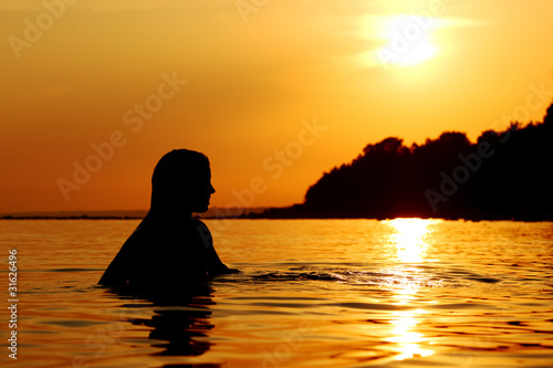 woman in ocean © yellowj