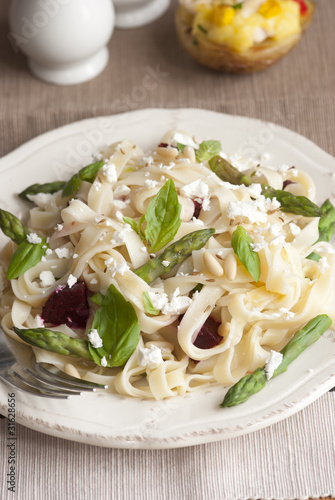 Asparagus and beetroot pasta with basil and cheese