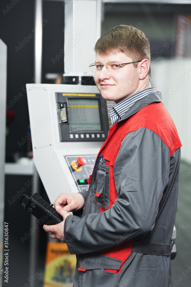 Fototapeta premium worker at machining tool workshop