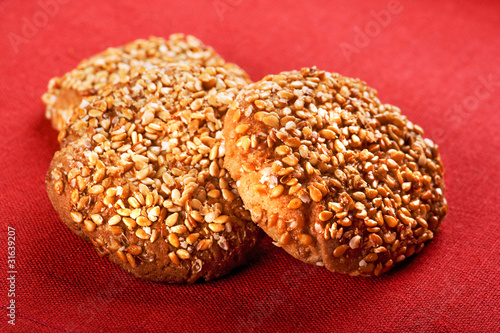 cookies on red close up © Aleksandr Ugorenkov